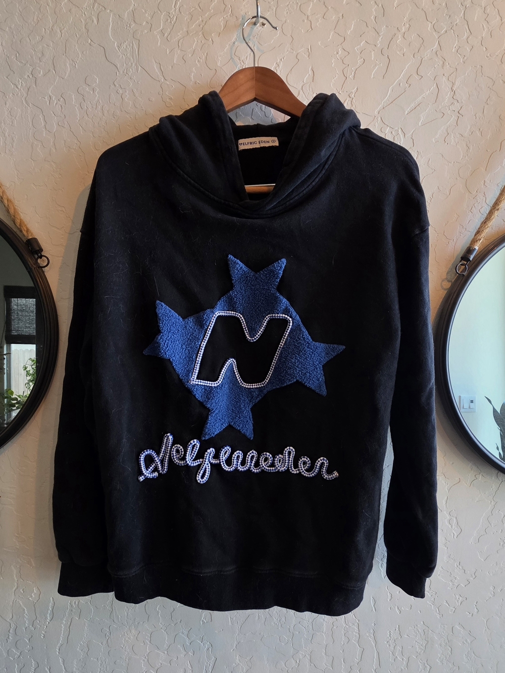 Aelfric Eden Black Crewneck Sweater with Blue Star Appliqué